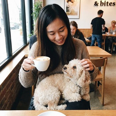Guest with pet enjoying coffee
